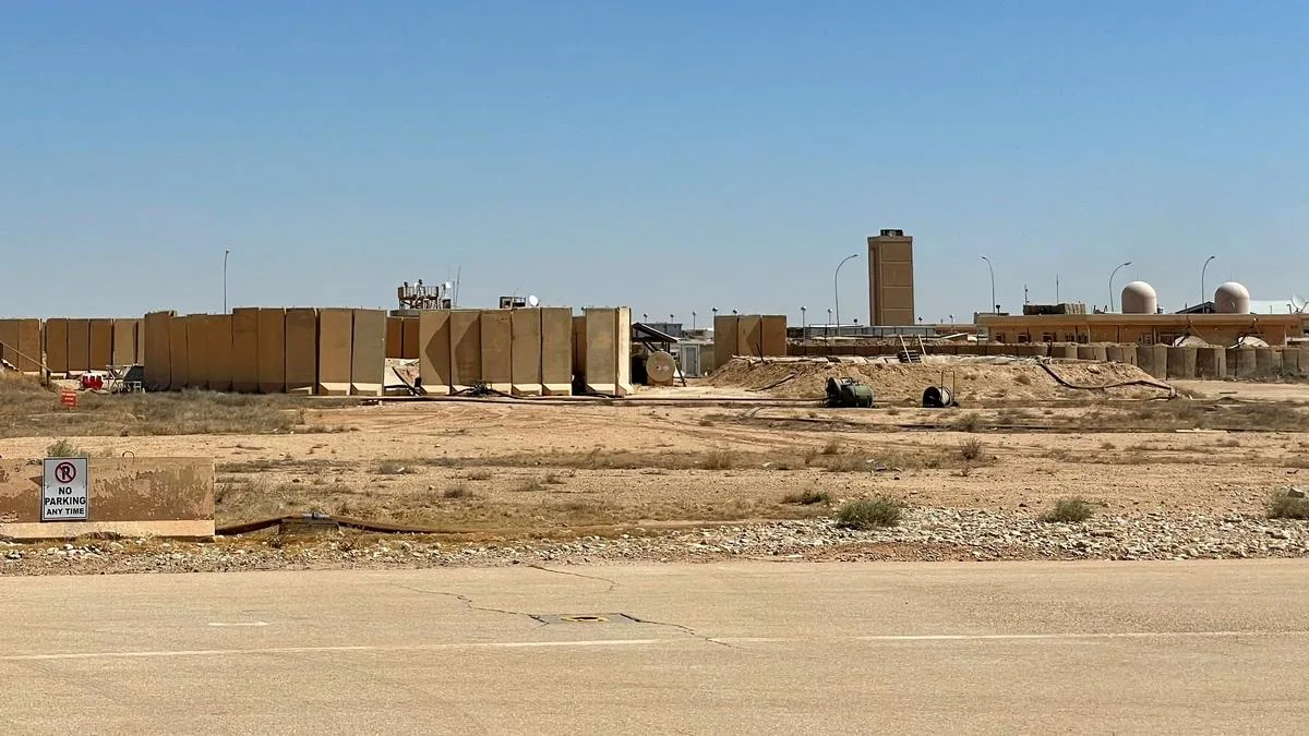 As the last U.S. troops pack up in Iraq, militias signal their weapons will stay