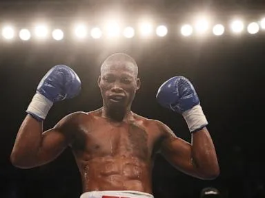 South African police arrest 4 in the killing of former champion boxer Zolani Tete