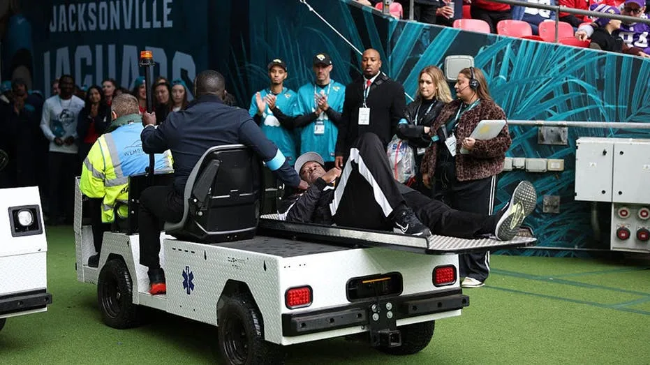 NFL line judge takes knee and appears to pray after umpire collapses during Jaguars-Texans London game