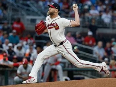 Chris Sale fans 10, reaches 200 strikeouts for the season as Braves edge Reds 3-2