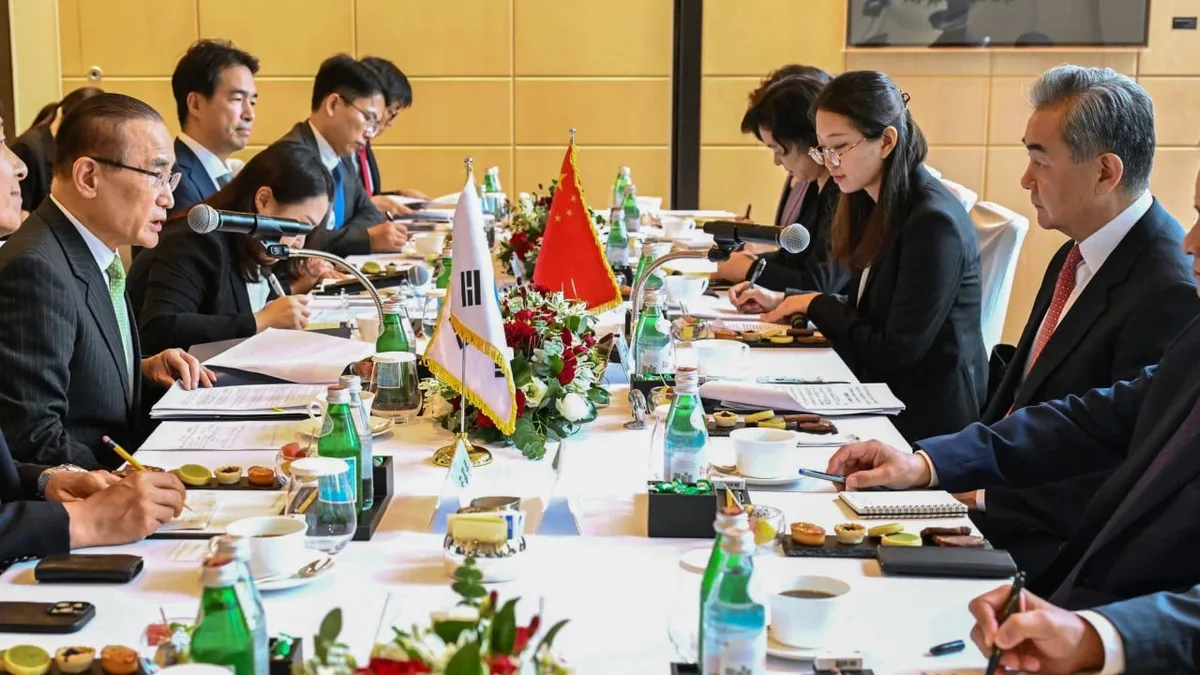 Wang Yi visits South Korea, China’s economy cools, Warsh speaks at Jackson Hole