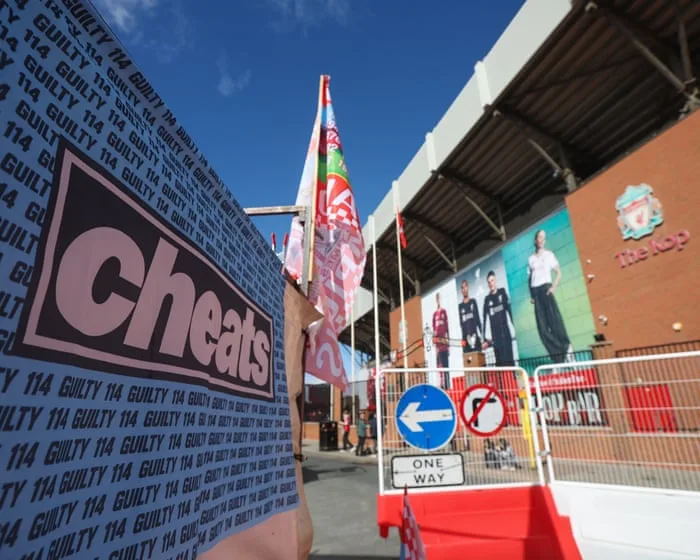 Police officer injured as 10 arrests made at tense Liverpool v Manchester City match
