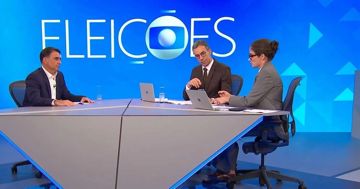 Renata ‘salva’ Tralli ao mostrar folha com pergunta que ele não achava ao entrevistar Flávio