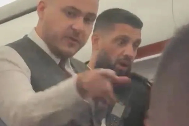 Dramatic moment UK police escort passengers off easyJet flight caught on camera