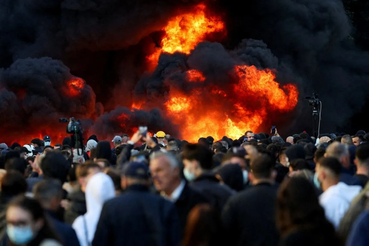 Buildings ablaze in Albanian capital as violent student protests erupt