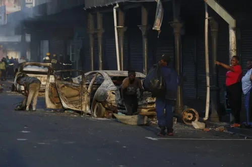 IN PICS: Anti-immigration protests turn violent as cars burn and shops are vandalised across South Africa