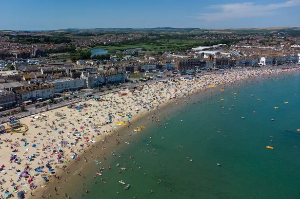 Woman in her 20s raped metres from Weymouth beach as police seal off area