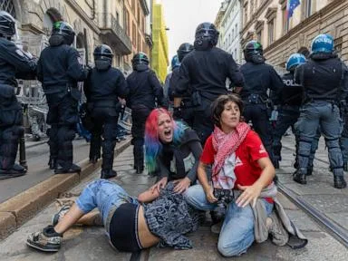 Rioters loot stores, set fires in central Milan during cost-of-living protest