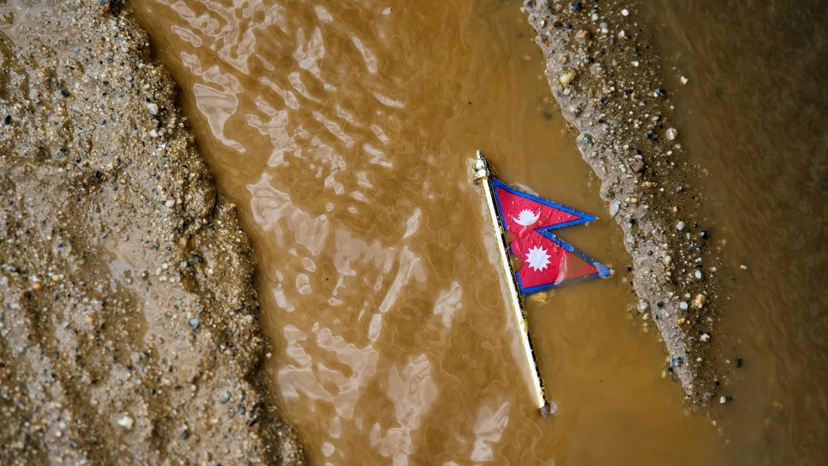 Mass burials in Nepal as death toll from flash floods exceeds 1,000