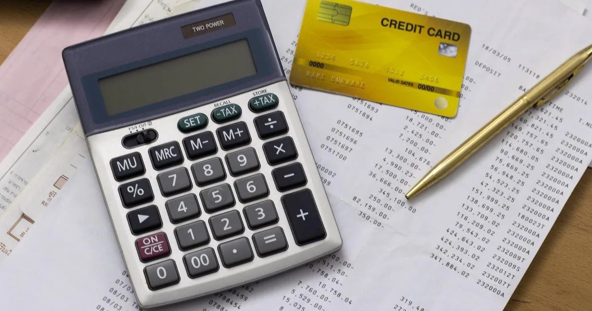 How much would settling $15,000 in credit card debt cost after fees?