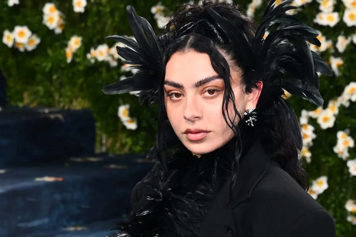 Heavy rain subsides as Charli XCX takes to stage at Reading Festival