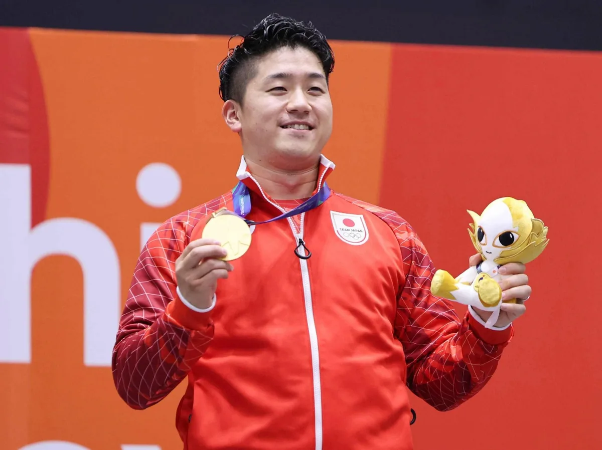 Japan takes Asian Games gold in swimming and karate