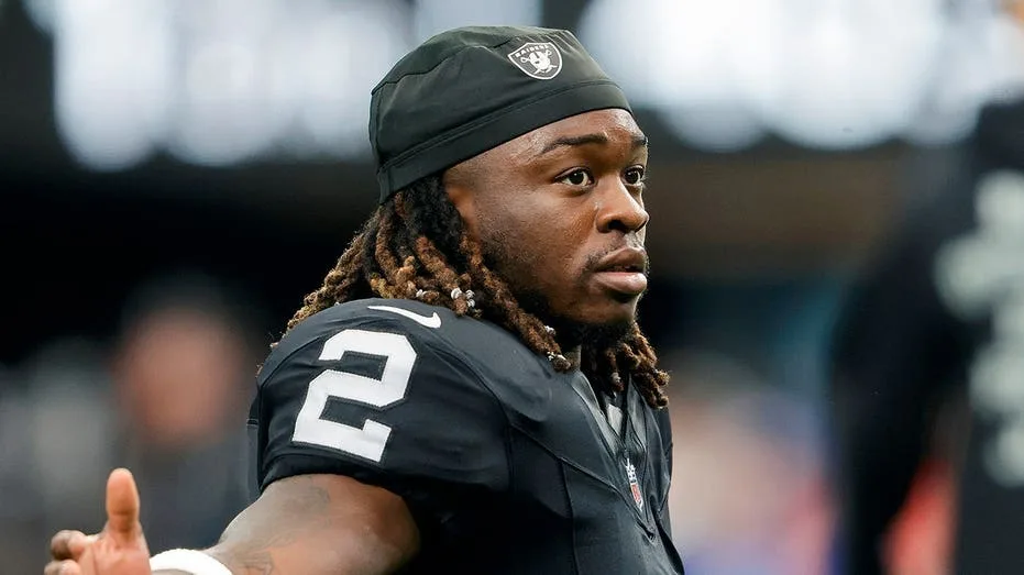 Raiders star Ashton Jeanty suffers apparent leg injury during training camp practice, helped off field
