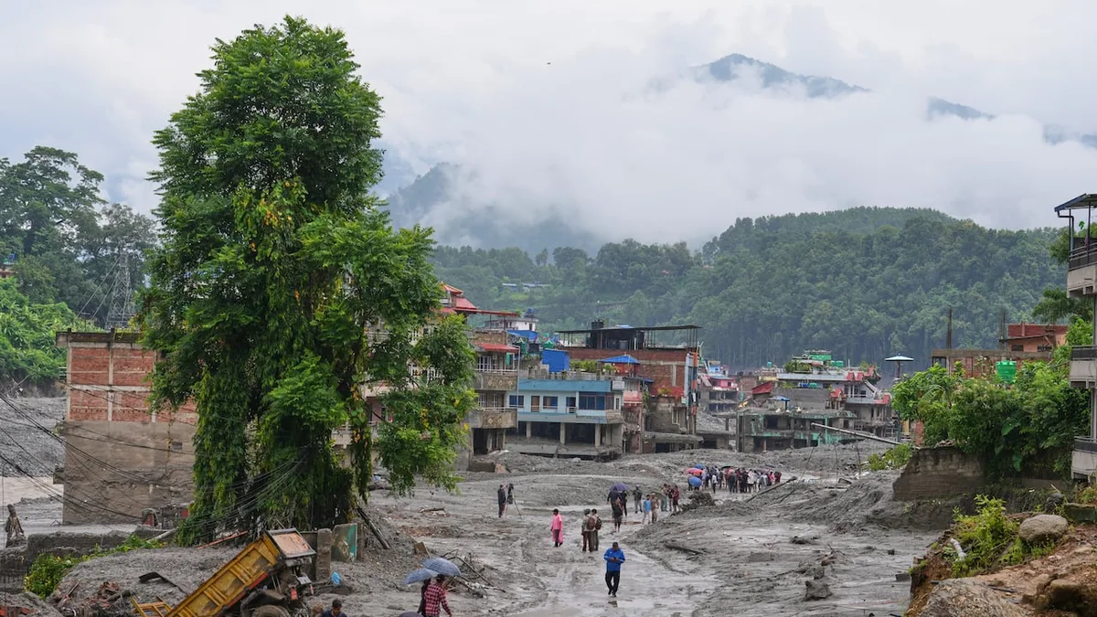 Rescuers search for thousands following deadly Nepal-China flood