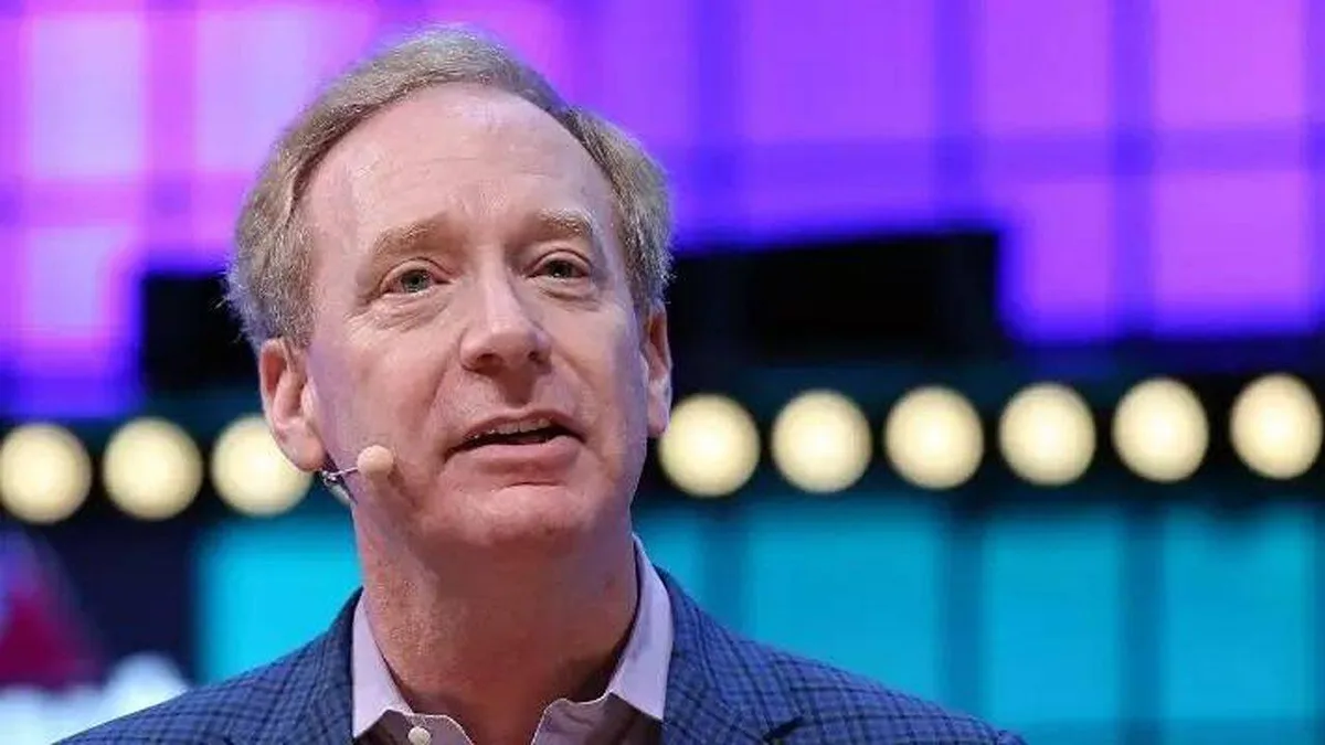 Microsoft president says washing machines and milk face more safety rules than AI