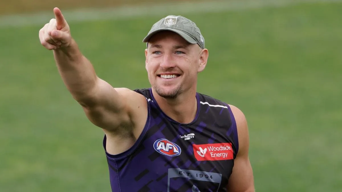 Contrasting emotions between Brennan Cox and Oscar McDonald at training hints at brutal selection call for grand final