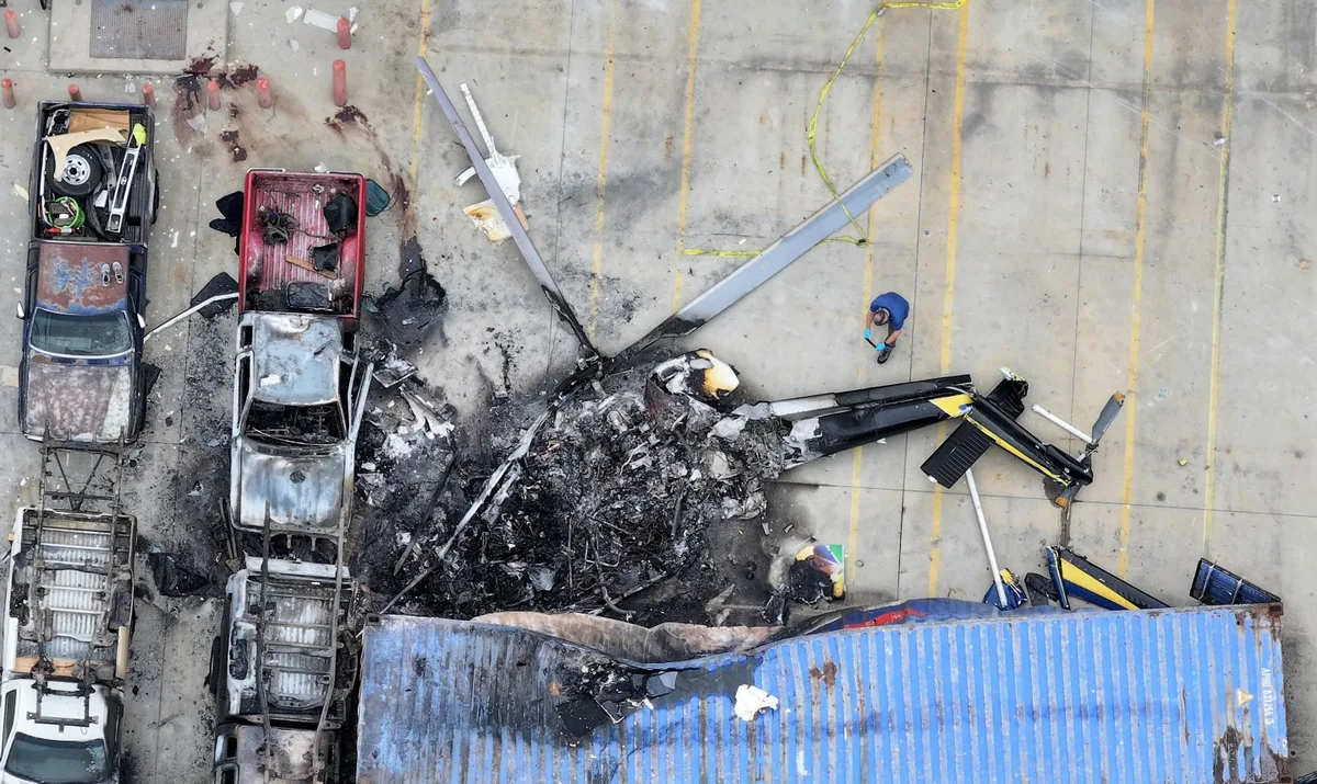 Woman Arrested on Murder Charge in Wrong-Way Bus Accident That Led to Deadly News Helicopter Crash