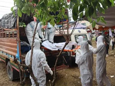 In one Nepal district, flood catastrophe is measured in bodies and burial trenches