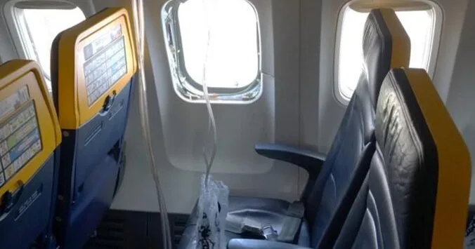 Evidence of bird strike after man nearly sucked out of plane window, NTSB says
