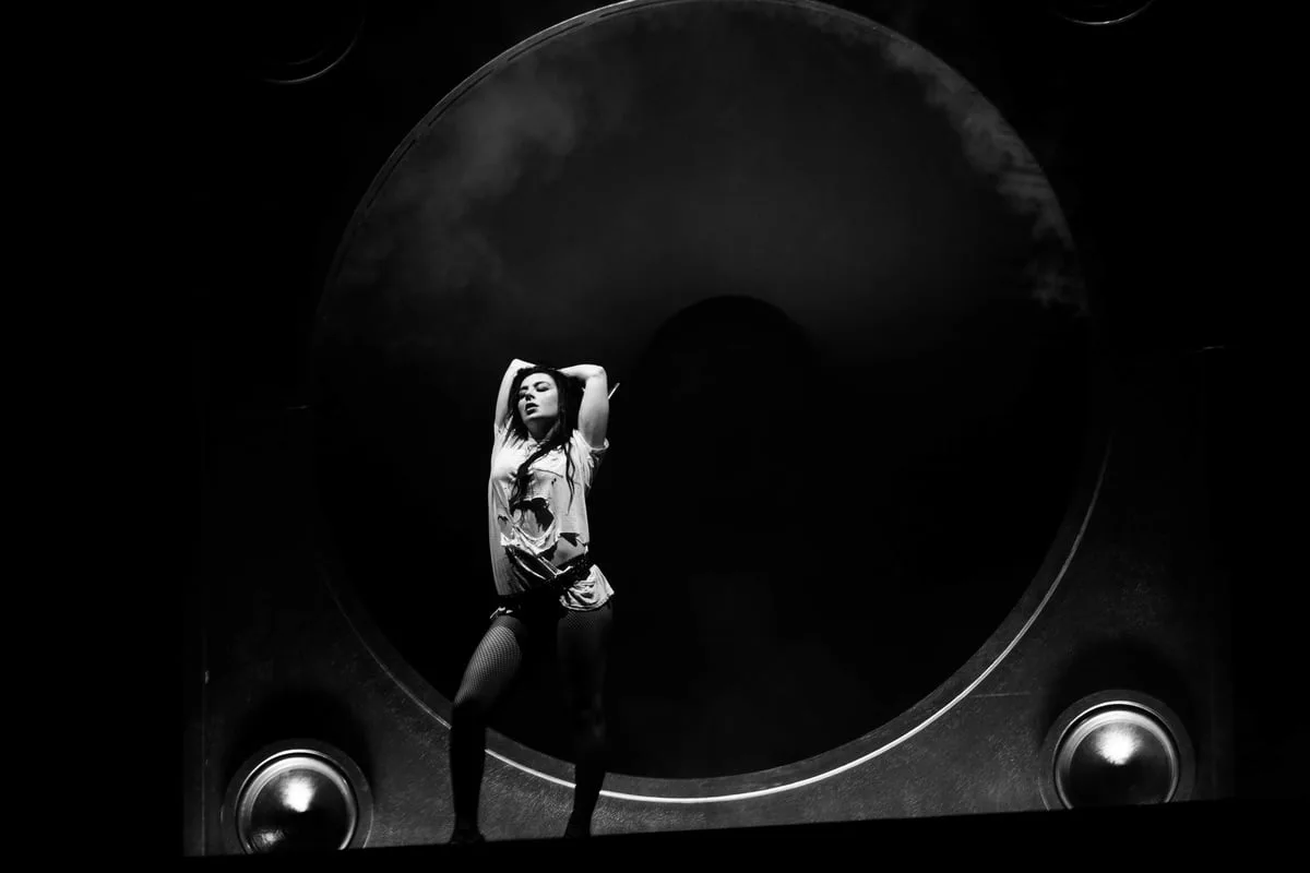 Heavy rain subsides as Charli XCX takes to stage at Reading Festival