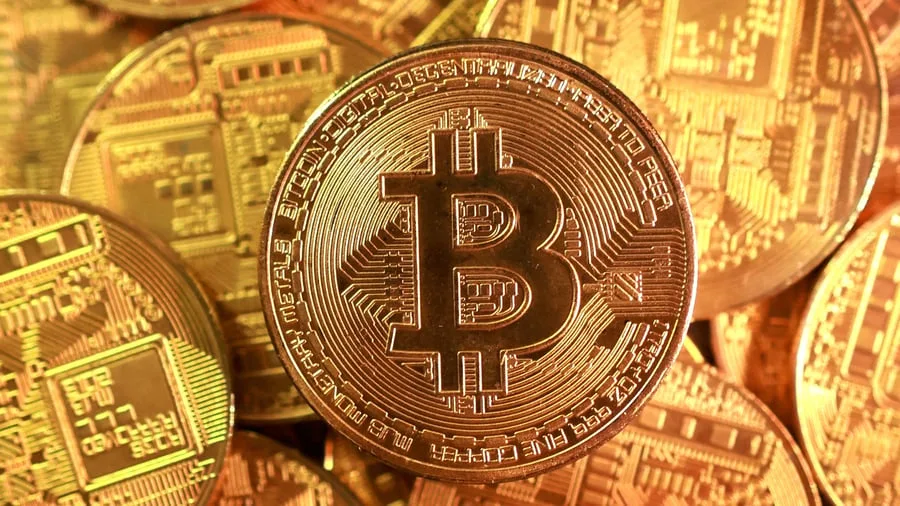 Krypto: Größter Wochengewinn seit zwei Jahren: Bitcoin legt deutlich zu und steigt über 77.000 Dollar