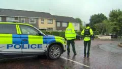 Murder investigation after man found dead and child seriously injured