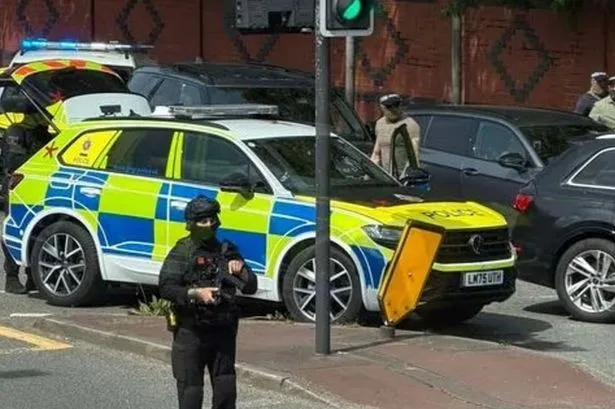 Drug dealer shot in arm by police carrying out surveillance