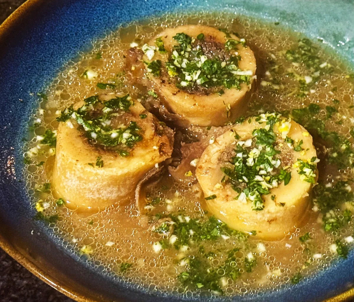 WHAT’S COOKING: Roasted marrow bones in a beef and onion broth, with gremolata