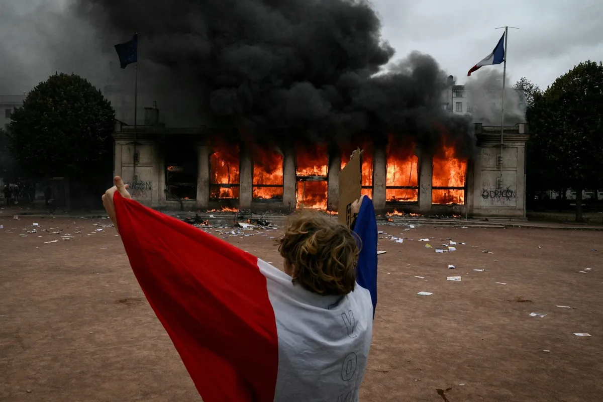 ‘France, truly, is on the brink’ and just days away from a make-or-break moment in its debt crisis, analyst warns, as protests turn into riots