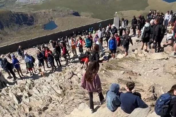 Rows break out at top of Mount Snowdon amid 'hour-long queues' to reach summit