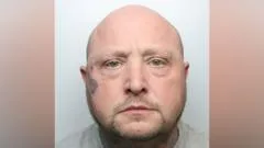 Man who kept wife's body in freezer jailed for life