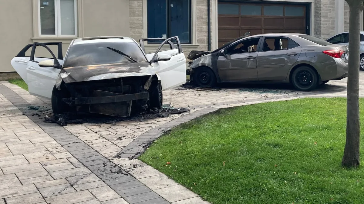 Police investigating suspected arson after car at Liberal MP's home torched