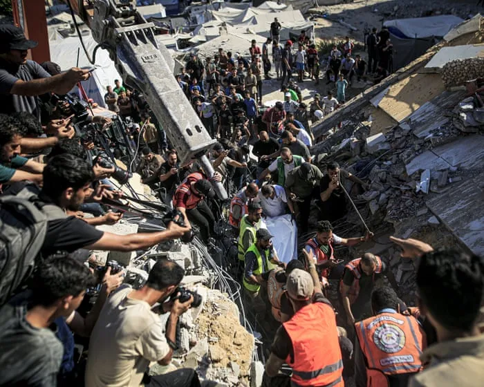 At least 16 killed after building in Gaza City damaged by Israeli strikes collapses