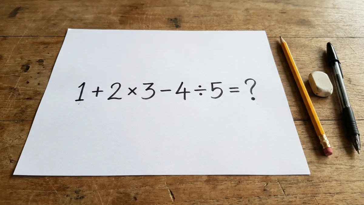 Resolva 1 + 2 × 3 − 4 ÷ 5 e teste se você consegue chegar ao resultado correto sem calculadora