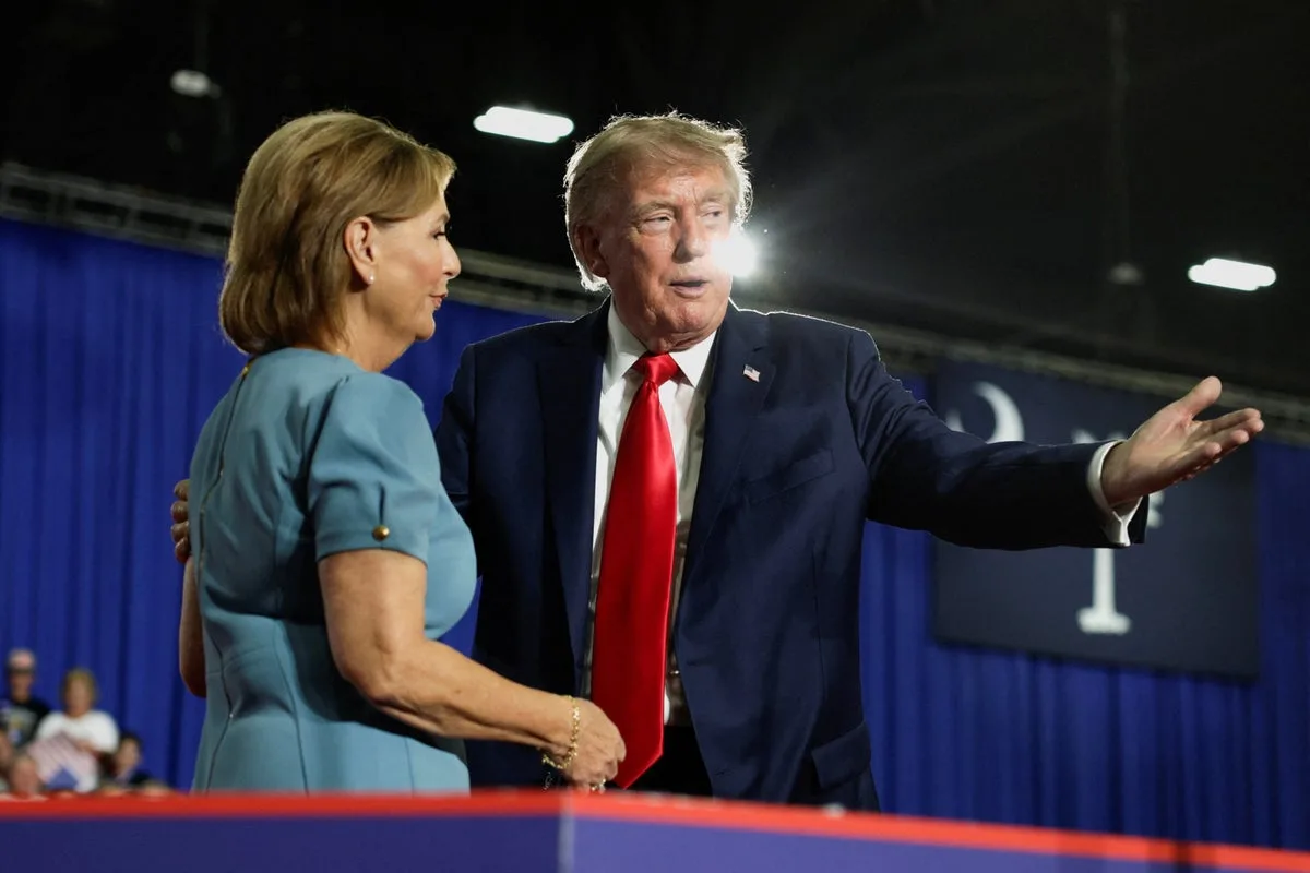 Trump interrupted by protester as he stumps for Darline Graham after debate gaffe