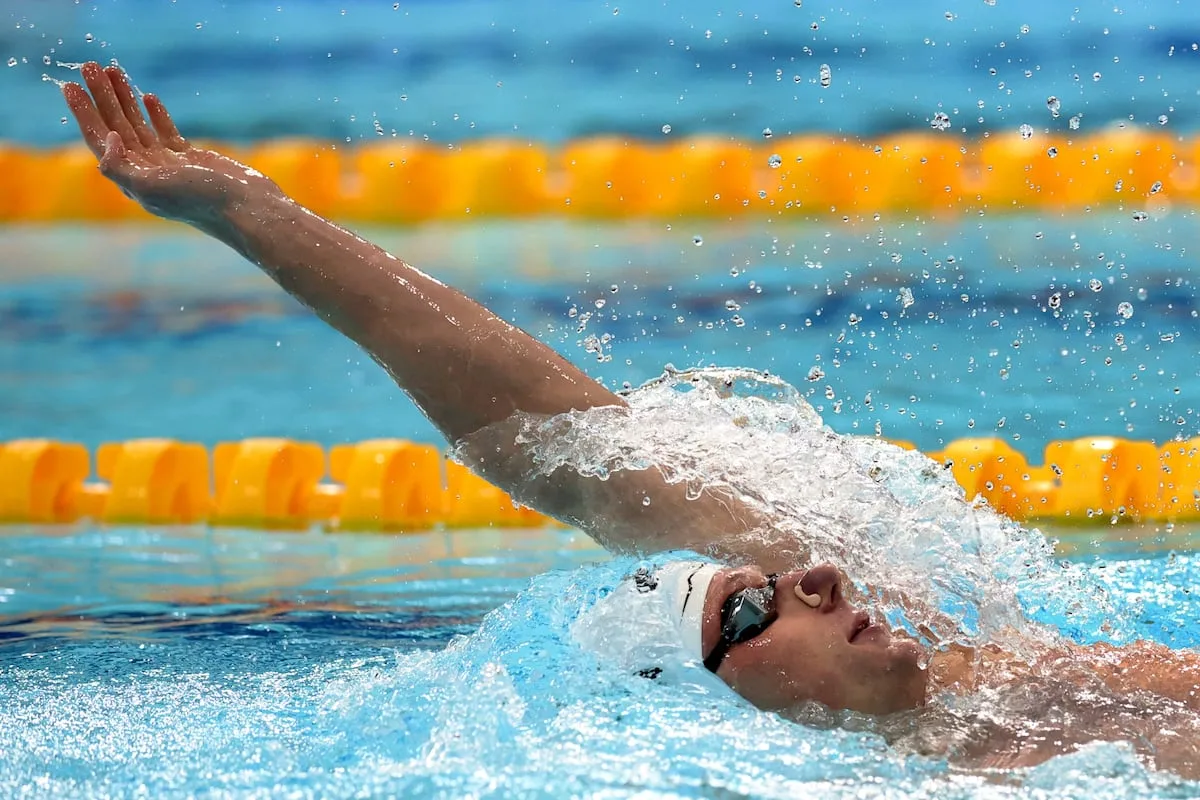 Pieter Coetzé in battle for World Cup glory after 200m backstroke victory