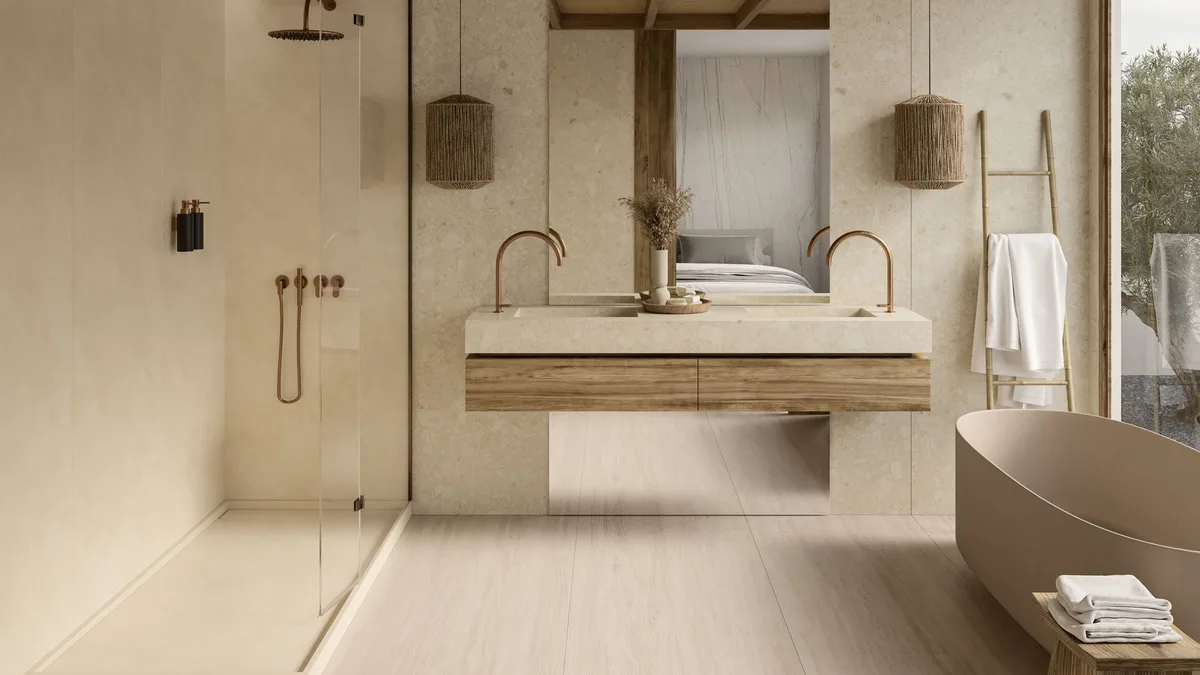 Los baños que veremos en 2027: madera en la ducha, mármol y paredes que lo envuelven todo
