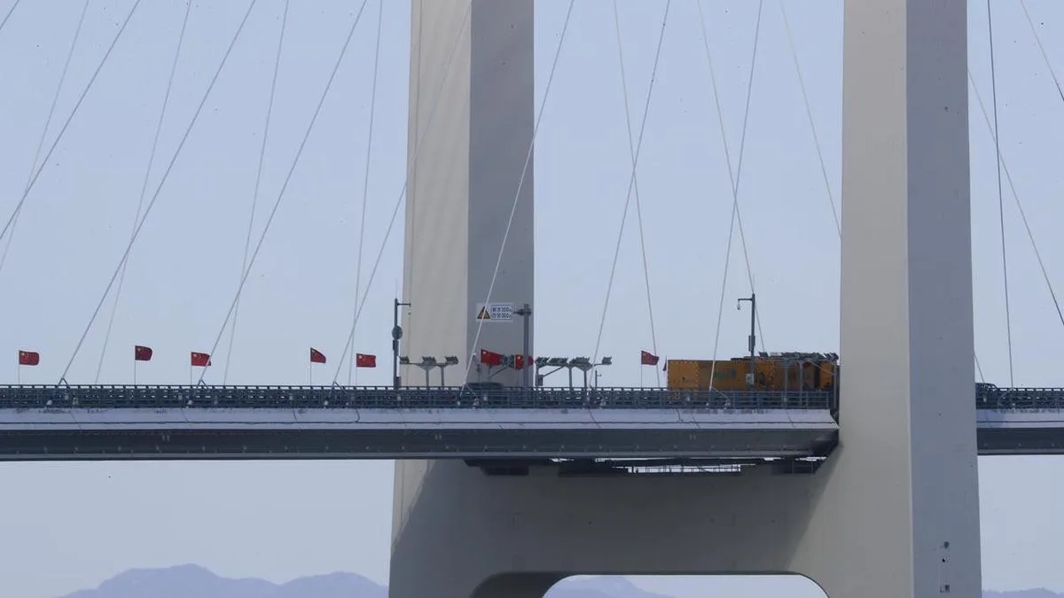 China, North Korea open long-delayed four-lane bridge
