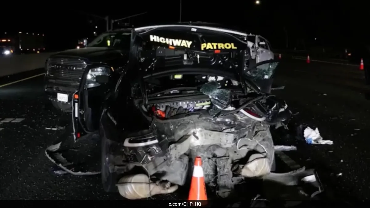 Video: Sleeping Driver Using Tesla's Self-Driving Mode Crashes Into Police Car
