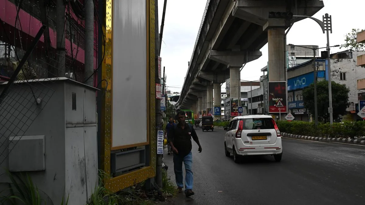 Concern over digital master boards at junctions creating blind spots, obstructing pedestrians