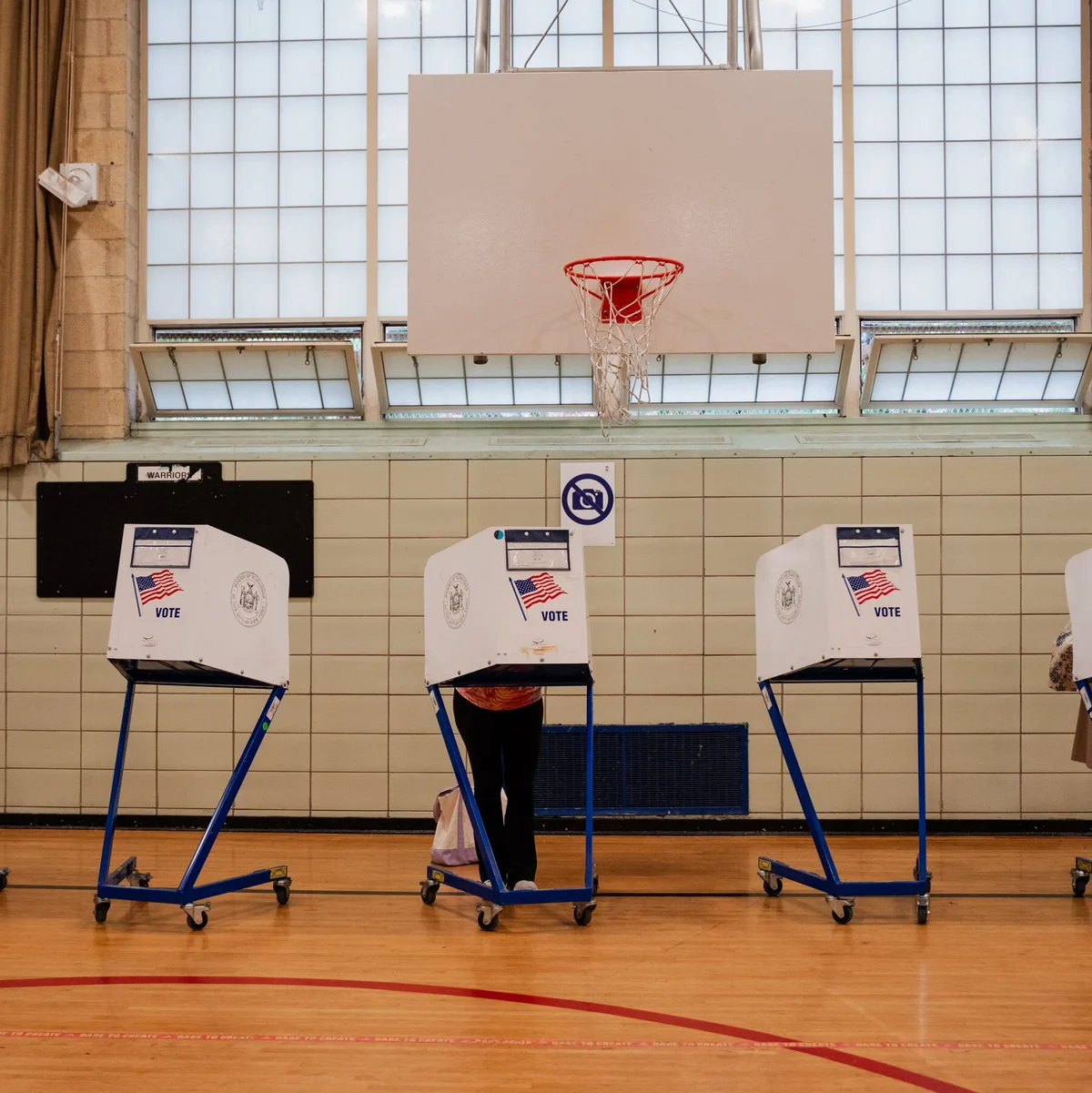 Civil Rights Groups Sue to Keep Armed Agents Away From Voting Sites