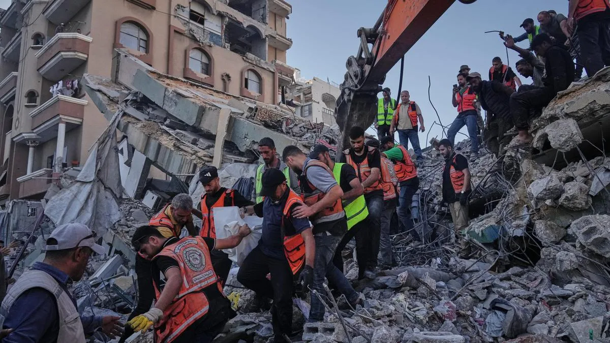 War-damaged Gaza building collapses, killing 20 people sheltering inside