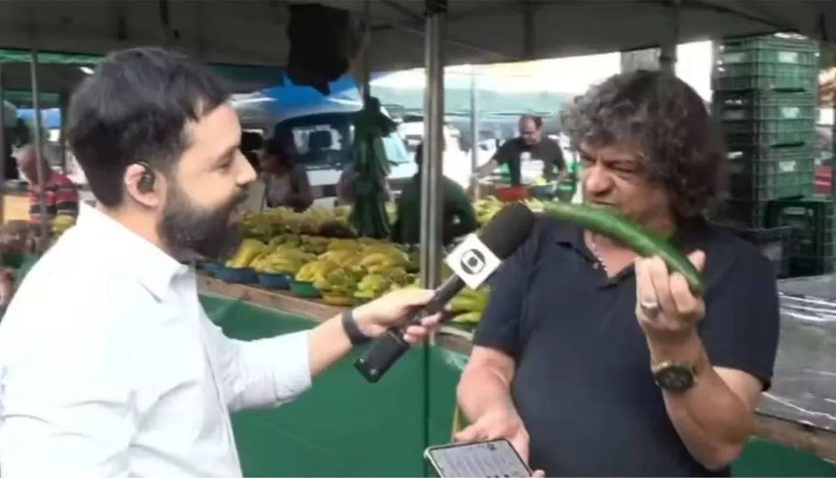 Repórter da TV Gazeta é surpreendido por pegadinha com pepino durante entrevista ao vivo