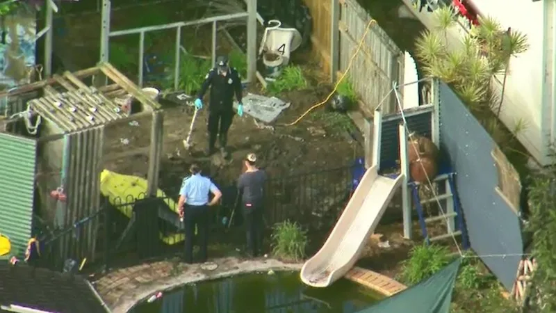 Pair charged with murder after human remains found south of Brisbane