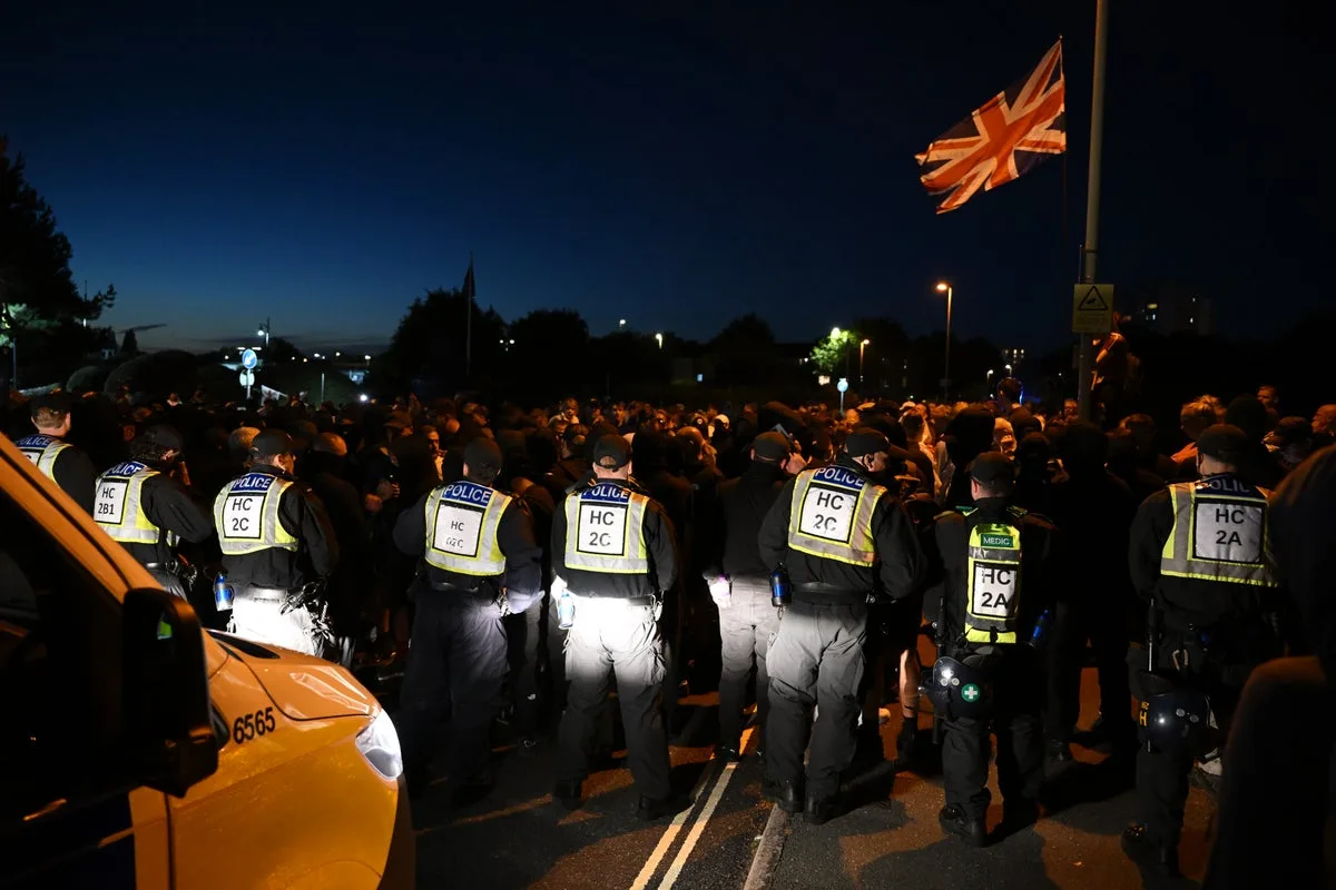 Three people charged with assaulting emergency workers during anti-migrant protest in Gosport