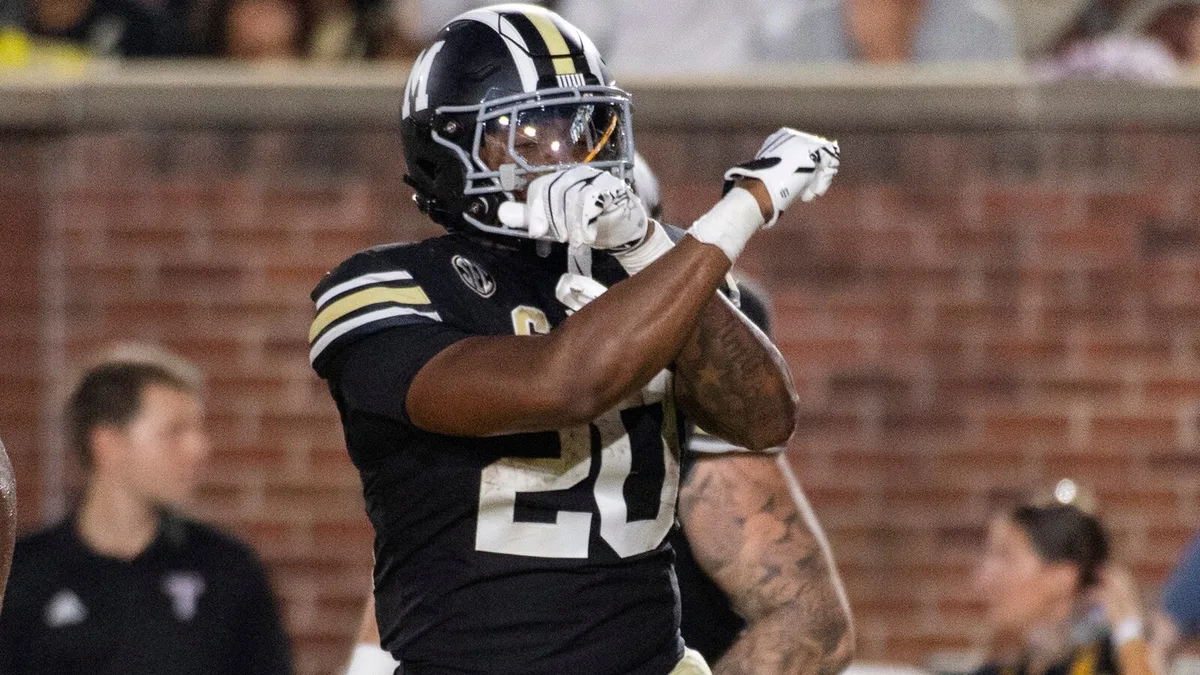 Roberts runs for 122 yards and a TD, No. 20 Missouri hangs on after a slow start to beat Troy 27-17