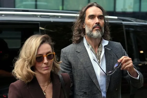 Russell Brand arrives at court with wife as rape and sexual assault trial starts today