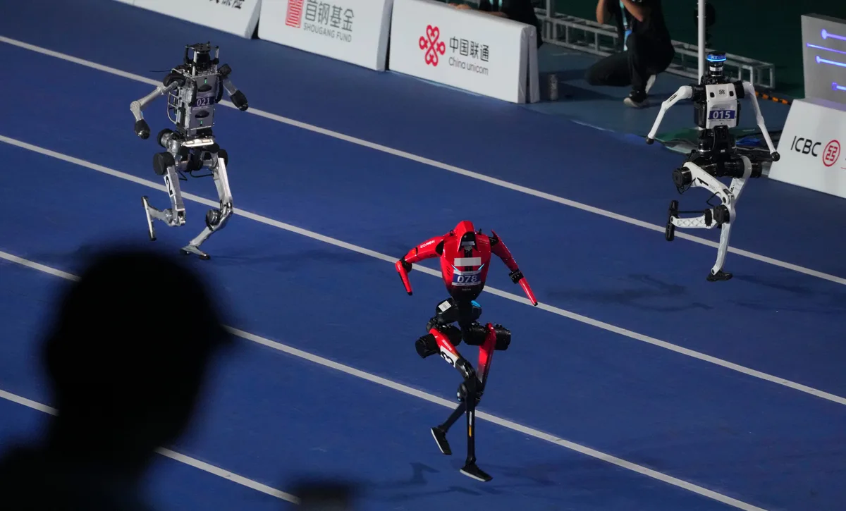 Human 100 m sprint and high-jump records beaten at Beijing’s robot games