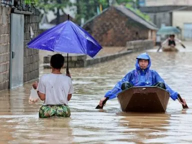 Heavy rain and floods in northern Vietnam submerge homes and disrupt economy