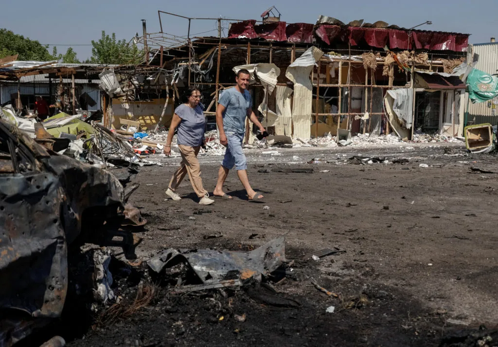 The Moscow region is hit by almost 800 drones as Russian missiles kill 10 in a Ukrainian village